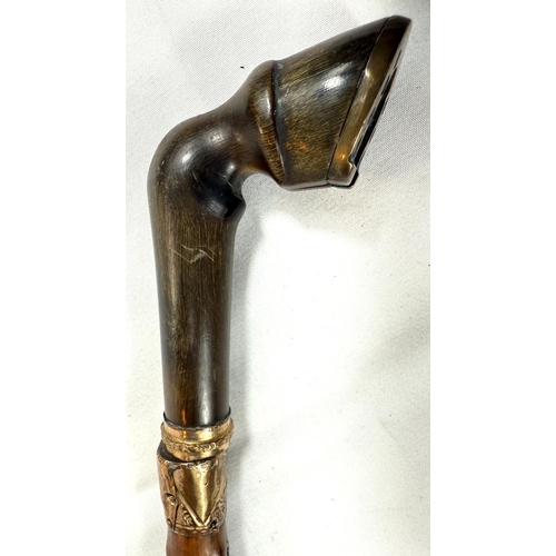 55 - A 19th Century sword stick with polished briar shaft and gilt metal mounted horn handle in the form ... 