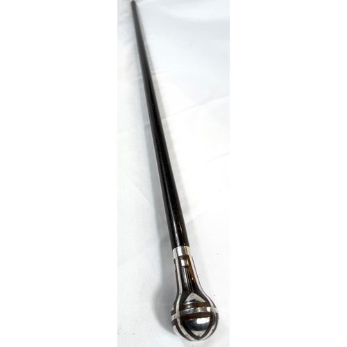 56 - A continental walking stick with hardwood shaft and silver inlaid decoration to the finial in the se... 