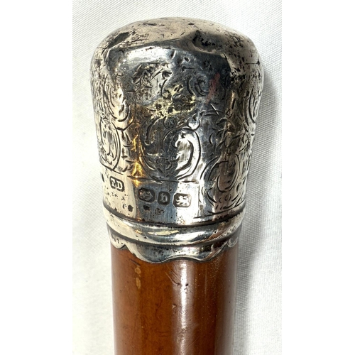 57 - A late 19th Century Malacca walking cane with silver finial, 89cm, and two similar sticks (3).