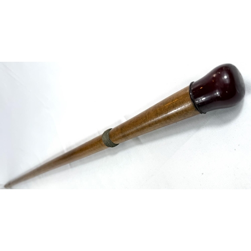 61 - A vintage polished sycamore walking cane with composition knop having a concealed torch, 90cm.