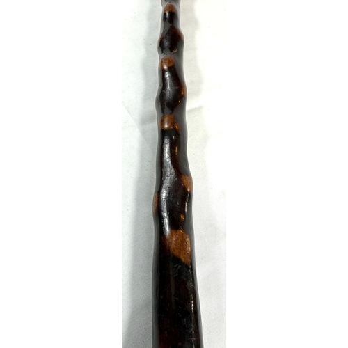 67 - A vintage polished wood stick with foot finial, 89cm, and another (2).