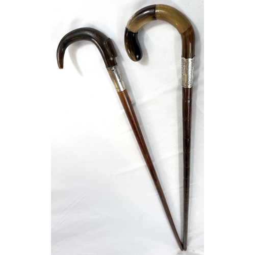 68 - Two vintage silver-mounted horn-handled walking sticks, 92cms each (2).