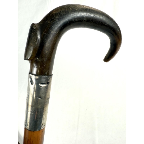 68 - Two vintage silver-mounted horn-handled walking sticks, 92cms each (2).