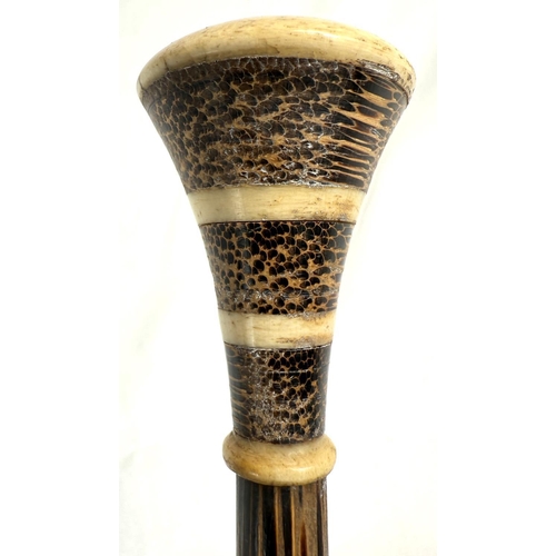 7 - A 19th Century walking stick with carved ivory elephant's head handle and silver band, 92cms, and si... 