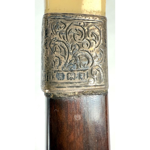 7 - A 19th Century walking stick with carved ivory elephant's head handle and silver band, 92cms, and si... 