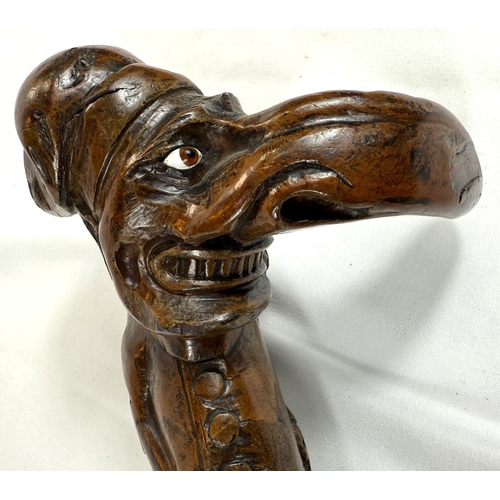 71 - A 19th Century carved wood stick with 'Mr Punch' finial, 77cms.