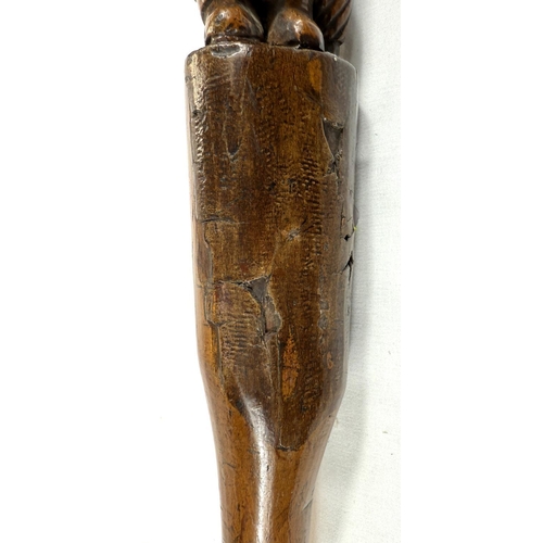 71 - A 19th Century carved wood stick with 'Mr Punch' finial, 77cms.