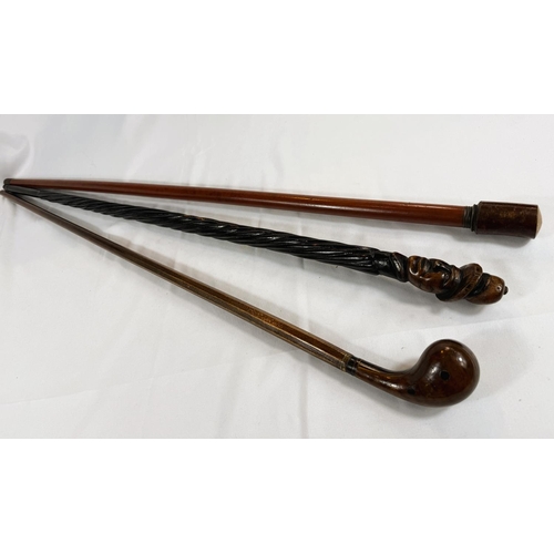 74 - Three vintage walking sticks with decorative finials, 86-89cms (3).