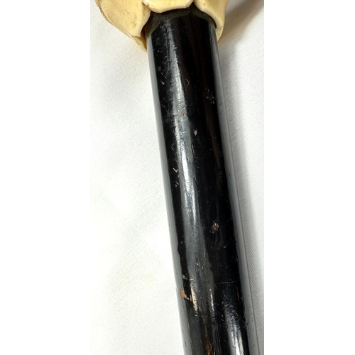 9 - A 19th Century walking stick with carved ivory finial of a bulldog in a driver's cap, 89cms.Submissi... 