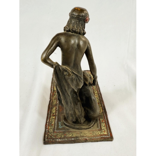 909A - After Franz Bergmann, cold painted bronze of nude female on rug, with tiger on chain, mark to base, ... 