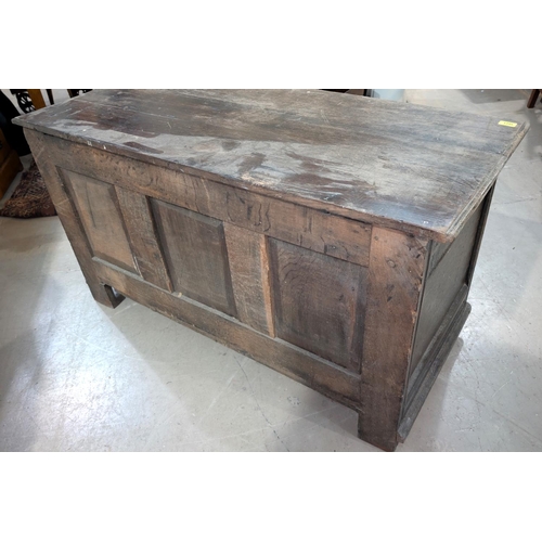 1021 - An 18th century oak framed and panelled blanket box with plank top and 3 arched panels to the front,... 