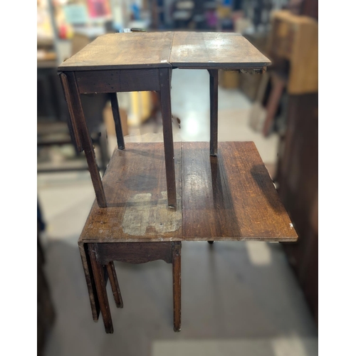 1026 - A Georgian mahogany drop leaf dining table on chamfered legs, extended length 152cm; a similar small... 