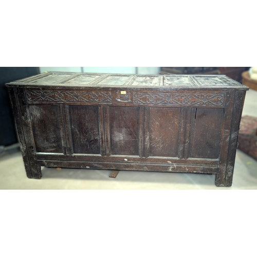 1029 - A large late 17th/early 18th century framed and panelled oak coffer with 5 panel front and blind fre... 