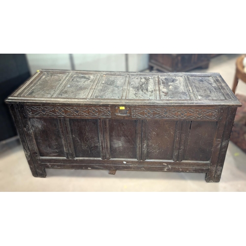 1029 - A large late 17th/early 18th century framed and panelled oak coffer with 5 panel front and blind fre... 