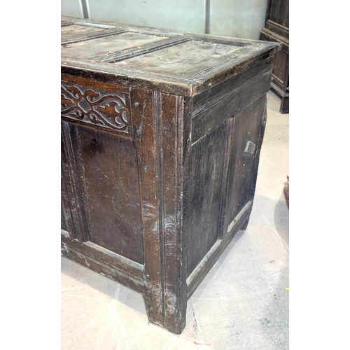 1029 - A large late 17th/early 18th century framed and panelled oak coffer with 5 panel front and blind fre... 