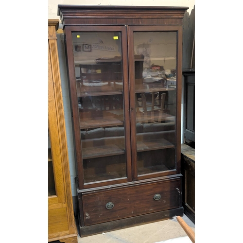 1074 - A late 19th/early 20th century mahogany full height display cabinet enclosed by 2 glazed doors with ... 