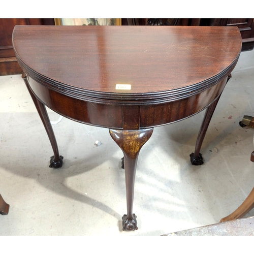 1087 - A mid-20th Century Georgian-style mahogany fold-over card table on cabriole legs and ball and claw f... 