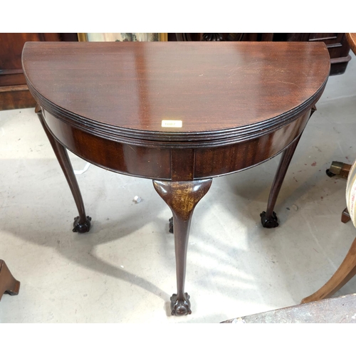 1087 - A mid-20th Century Georgian-style mahogany fold-over card table on cabriole legs and ball and claw f... 