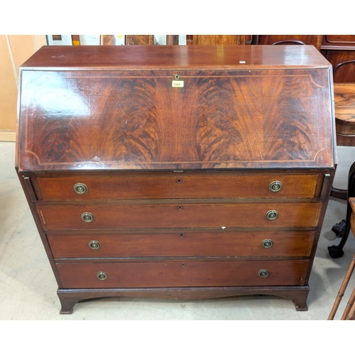 1088 - A late 19th/early 20th Century Georgian-style cross-banded figured mahogany fall-front bureau with f... 