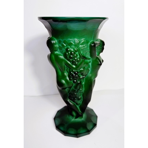 609 - A 1930's green malachite glass vase with three female nudes amongst fruiting vines, 21.5cm.