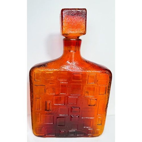 610 - An Empoli, Italy amber glass square narrow decanter with geometric design, 28.5cm; a heavy square am... 