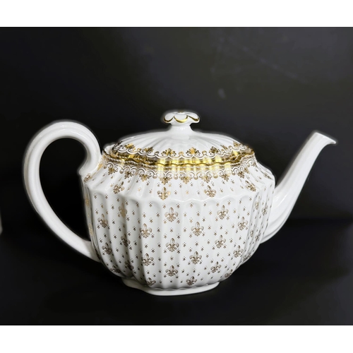 613 - A Spode Fleur de Lys white and gold teapot.