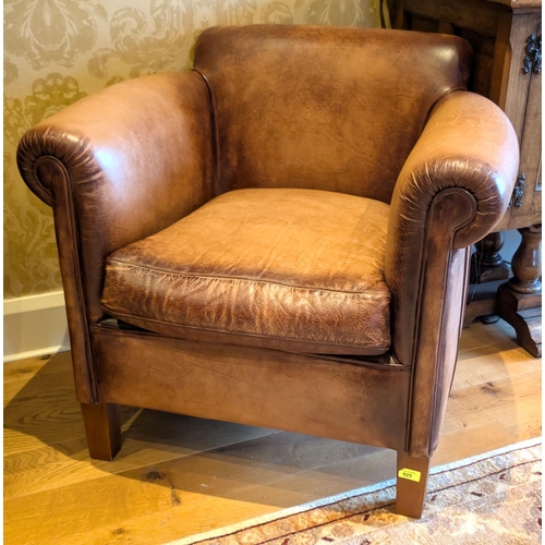 925 - A modern tan coloured, leather, library armchair, John Lewis