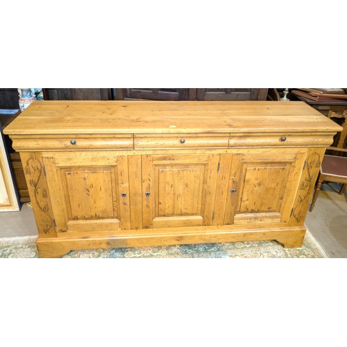 935 - A French Provincial distressed light oak dresser and base with 3 cupboards and 3 drawers, length 200... 