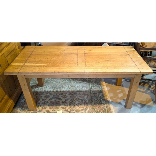 936 - A distressed light oak farmhouse style dining suite comprising rectangular dining table with 2 spare... 