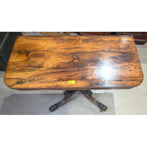 939 - A Regency period rosewood pedestal side table of rounded rectangular style on 'U' shaped column and ... 