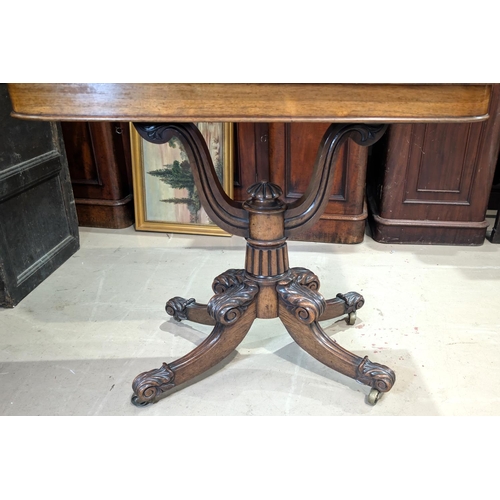 939 - A Regency period rosewood pedestal side table of rounded rectangular style on 'U' shaped column and ... 