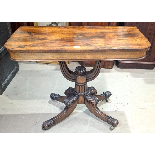 939 - A Regency period rosewood pedestal side table of rounded rectangular style on 'U' shaped column and ... 