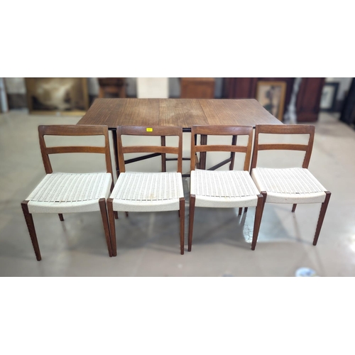 997 - A set of four mid 20th century teak dining chairs in the manner of Nils Jonsson Troeds and a teak dr... 