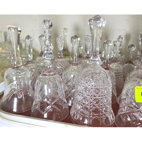 647 - A large selection of cut glass bells etc