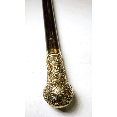 113 - A late Victorian swagger stick with 9ct gold finial, London, 1899, 60cm.