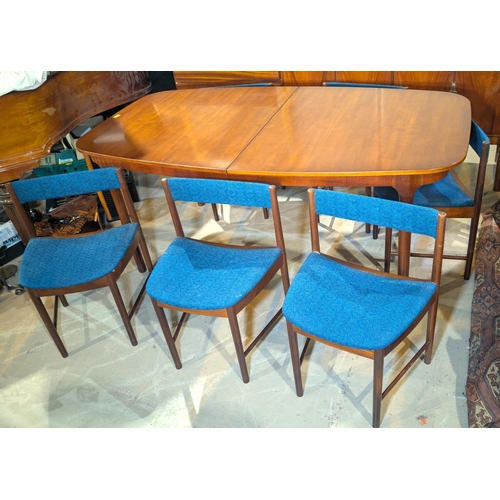 1003 - A mid 20th century teak A.H. McIntosh & Co. extending dining table and 6 McIntosh chairs No. 989... 