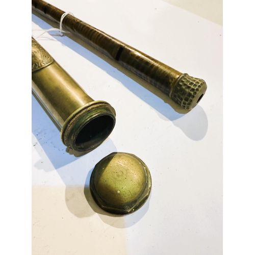 190 - An early 20th Century painted tin walking stick flute, 89cm, and a brass tubular weed eradicator (2)... 