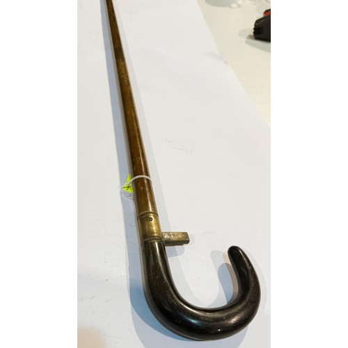 199 - A 19th Century German walking stick with horn handle and concealed horse measure, 99cm.