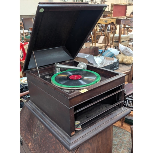 392 - A 1930's wind up gramophone in mahogany case.