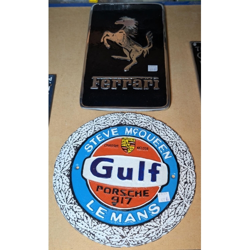 477B - A cast metal painted Gulf Le Mans style sign and a similar Ferrari sign.