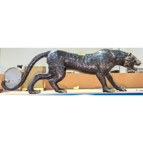 480 - A 20th Century Indian bronze of a prowling tiger, length 73cm.