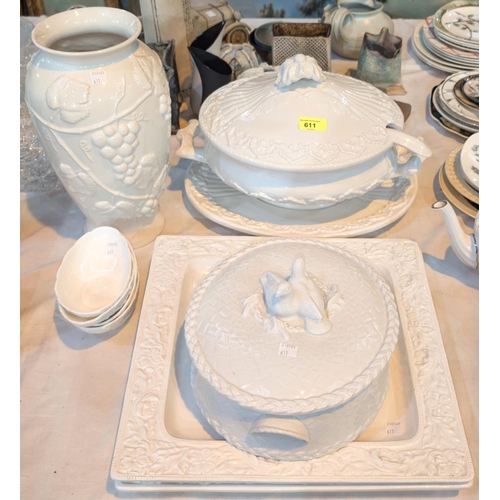 611 - A large white pottery lidded tureen and ladle on stand, other white serving dishes etc.