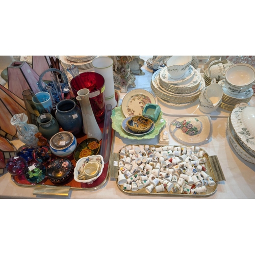 650 - A selection of coloured glassware and a collection of china thimbles.