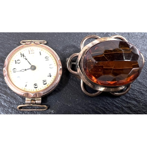 720 - An early 20th century 9ct gold cased lady's wristwatch, weight of back 2gms, stamped 375; a gilt bro... 