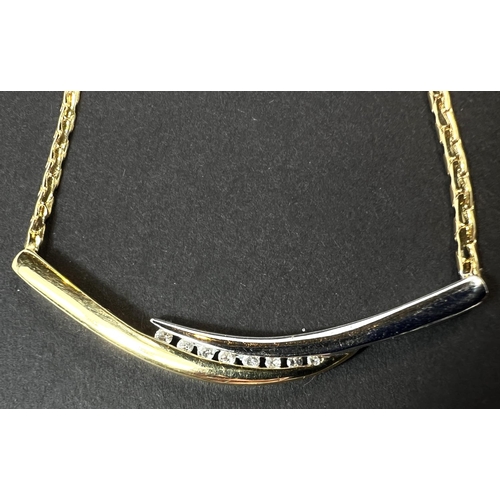 726 - A modernist 2 colour pendant set with 8 small diamonds on flattened link chain, stamped 750 and a ma... 