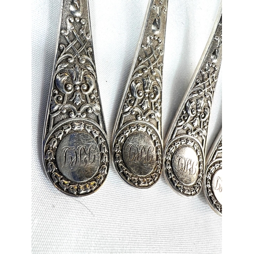 802 - A set of six hallmarked silver Victorian monogrammed tea spoons, 6.4oz.