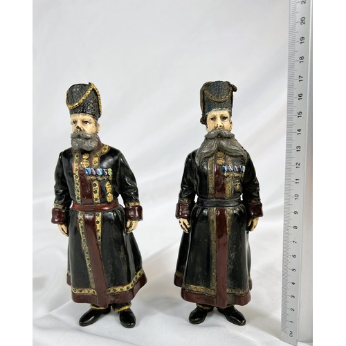 907 - A pair of Russian cold painted bronze figures of bodyguards, signed to feet and dated 1912, ht. 18cm