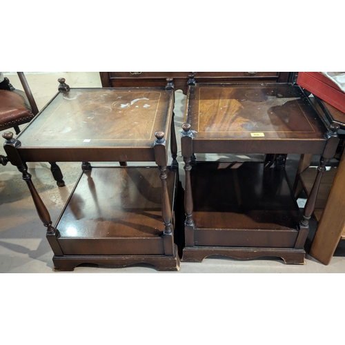 956 - A pair of Georgian-style figured mahogany two tier square top occasional tables and two wine tables.... 