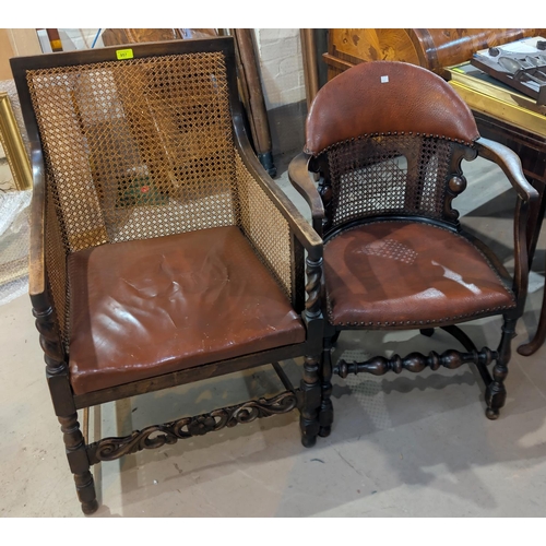 957 - A 1930's period style cane back armchair with barley twist side columns and a similar armchair.