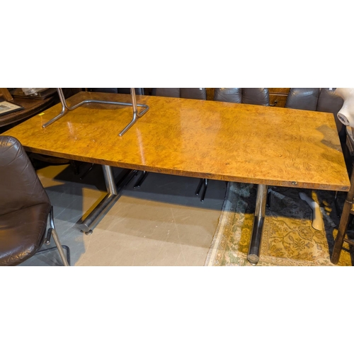 958 - A modernist rectangular birds eye maple dining table on chrome end supports, length 200cm; a set of ... 